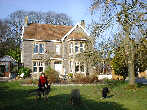 Wendy and dogs outside house in Nailsea